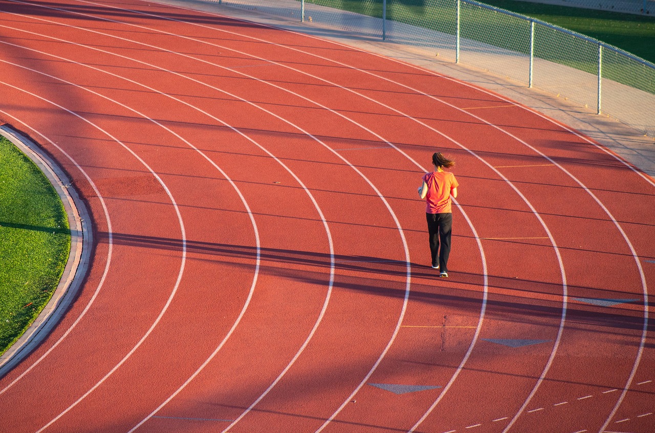 Running, woman, track — How to Build a Resilient Health Plan with Stuart Piltch